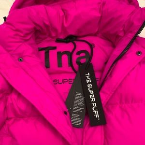 Pink Super Puff coat by Aritzia